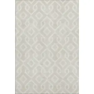 Photo of Beige And Ivory Geometric Washable Area Rug With UV Protection