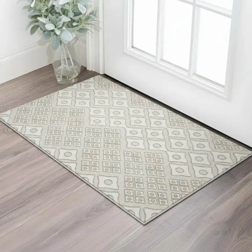 Beige And Ivory Geometric Washable Area Rug With UV Protection Photo 1