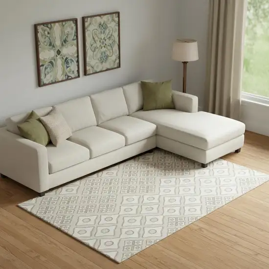 Beige And Ivory Geometric Washable Area Rug With UV Protection Photo 1