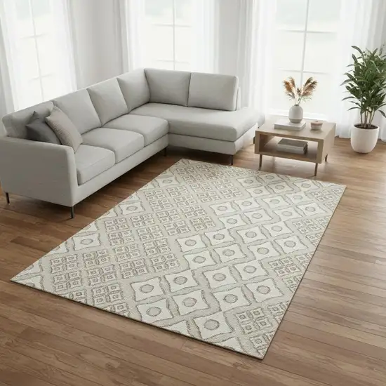 Beige And Ivory Geometric Washable Area Rug With UV Protection Photo 1