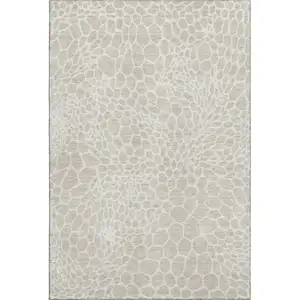 Photo of Beige And Ivory Geometric Washable Area Rug With UV Protection