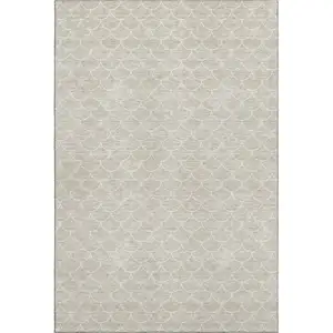 Photo of Beige And Ivory Geometric Washable Area Rug With UV Protection