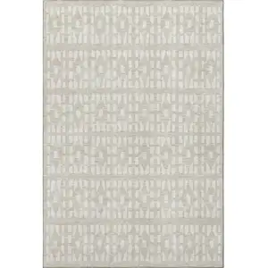 Photo of Beige And Ivory Geometric Washable Area Rug With UV Protection