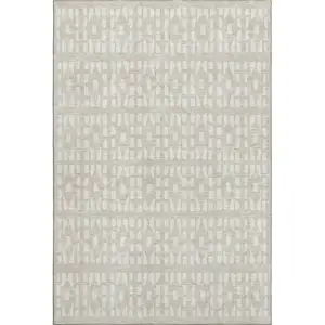 Photo of Beige And Ivory Geometric Washable Area Rug With UV Protection