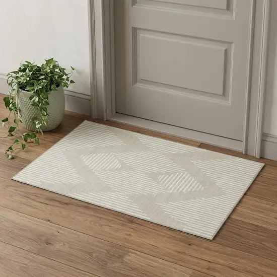 Beige And Ivory Geometric Washable Area Rug With UV Protection Photo 1