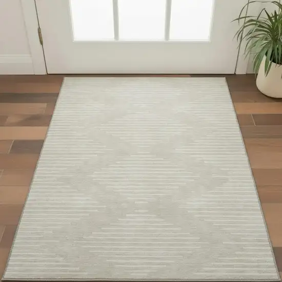Beige And Ivory Geometric Washable Area Rug With UV Protection Photo 2