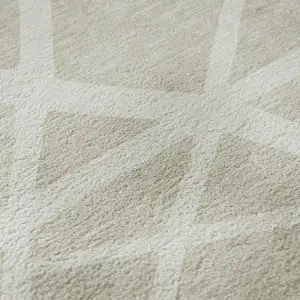 Photo of Beige And Ivory Geometric Washable Area Rug With UV Protection
