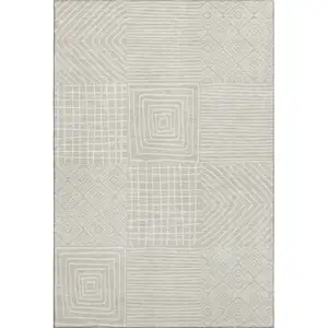 Photo of Beige And Ivory Geometric Washable Area Rug With UV Protection