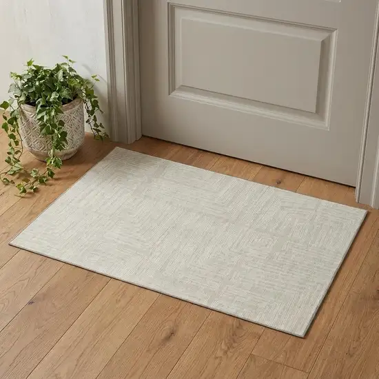 Beige And Ivory Geometric Washable Area Rug With UV Protection Photo 1