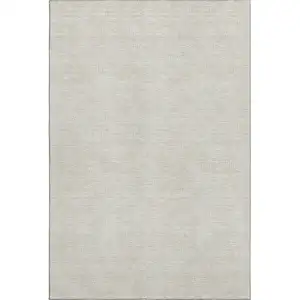 Photo of Beige And Ivory Geometric Washable Area Rug With UV Protection