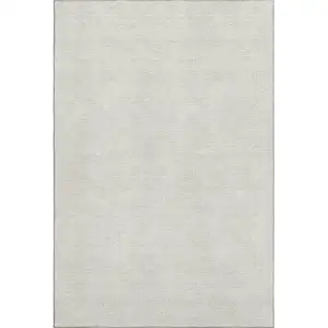 Photo of Beige And Ivory Geometric Washable Area Rug With UV Protection