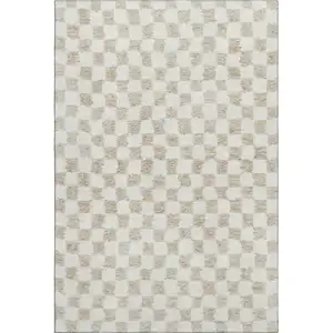 Photo of Beige And Ivory Geometric Washable Area Rug With UV Protection