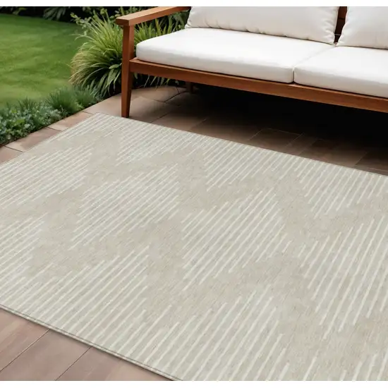 Beige And Ivory Geometric Washable Indoor Outdoor Area Rug Photo 1