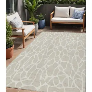 Photo of Beige And Ivory Geometric Washable Indoor Outdoor Area Rug