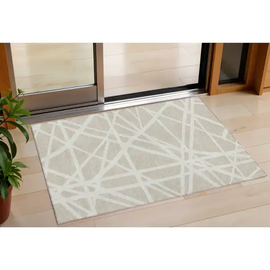 Beige And Ivory Geometric Washable Indoor Outdoor Area Rug Photo 1