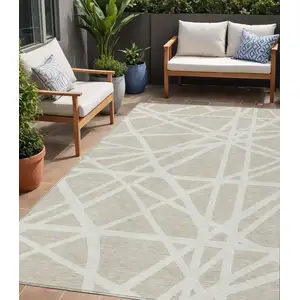 Photo of Beige And Ivory Geometric Washable Indoor Outdoor Area Rug