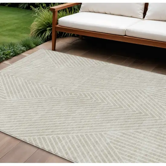 Beige And Ivory Geometric Washable Indoor Outdoor Area Rug Photo 1