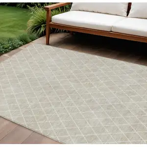 Photo of Beige And Ivory Geometric Washable Indoor Outdoor Area Rug