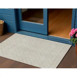 Photo of Beige And Ivory Geometric Washable Indoor Outdoor Area Rug