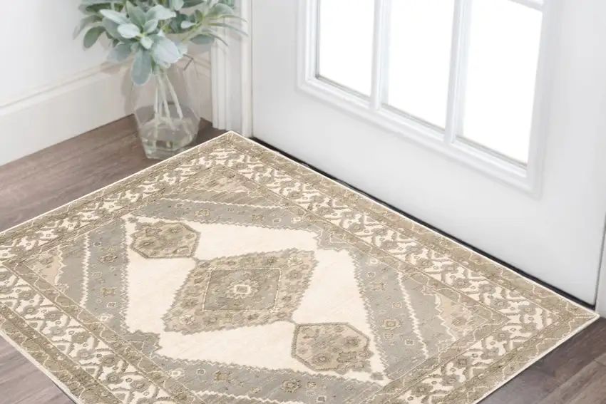 Beige and Ivory Oriental Power Loom Area Rug Photo 1