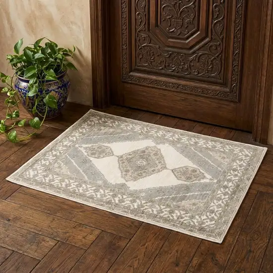 Beige And Ivory Oriental Area Rug Photo 1