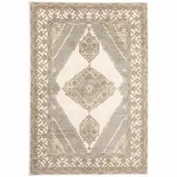 Photo of Beige And Ivory Oriental Power Loom Stain Resistant Area Rug