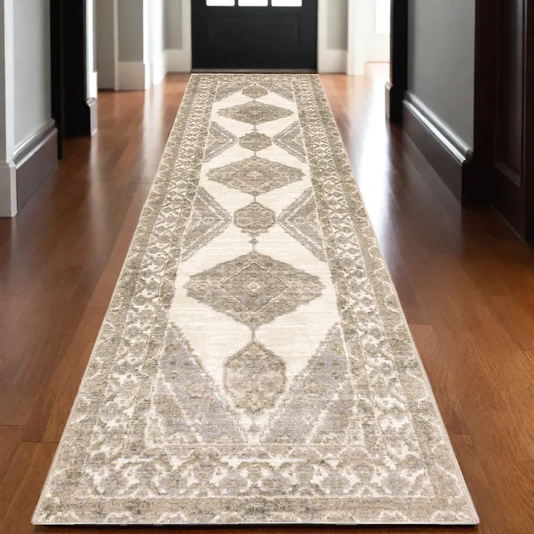 Beige And Ivory Oriental Power Loom Stain Resistant Runner Rug Photo 5