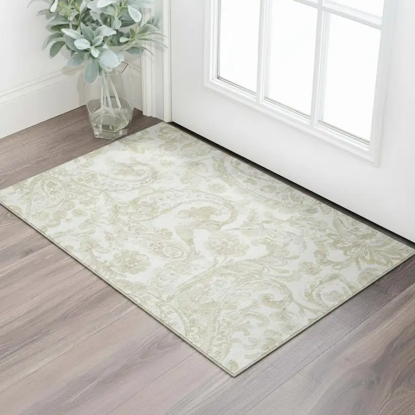 Beige And Ivory Paisley Washable Area Rug With UV Protection Photo 1