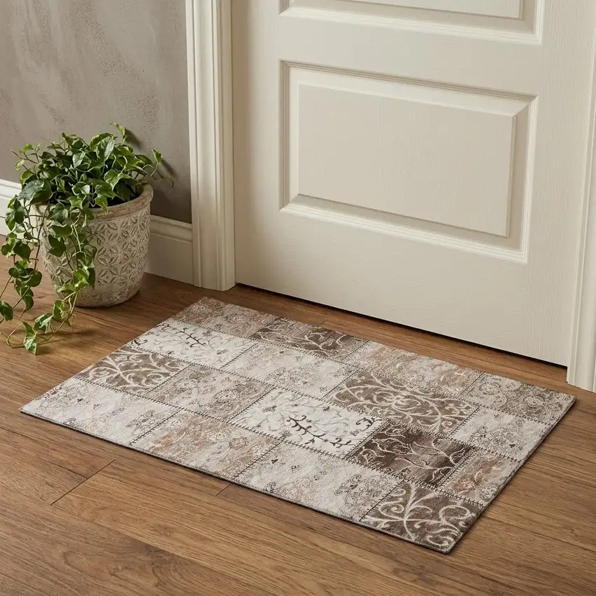 Beige And Ivory Patchwork Distressed Washable Area Rug With UV Protection Photo 1