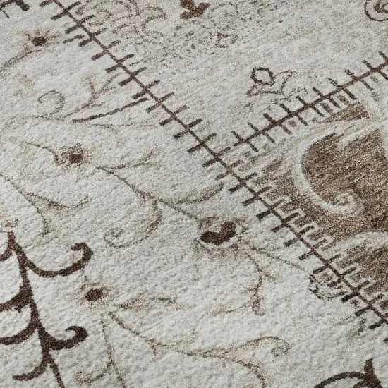 Beige And Ivory Patchwork Distressed Washable Area Rug With UV Protection Photo 9