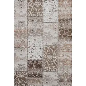 Photo of Beige And Ivory Patchwork Washable Area Rug With UV Protection