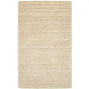 Photo of Beige And Ivory Striped Hand Tufted Area Rug