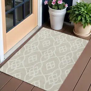 Photo of Beige And Ivory Trellis Washable Indoor Outdoor Area Rug