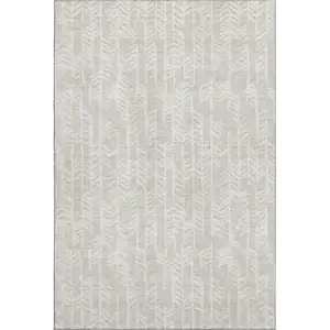 Photo of Beige And Ivory Tribal Washable Area Rug With UV Protection