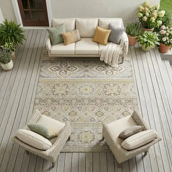 Beige And Ivory Tribal Washable Indoor Outdoor Area Rug Photo 1