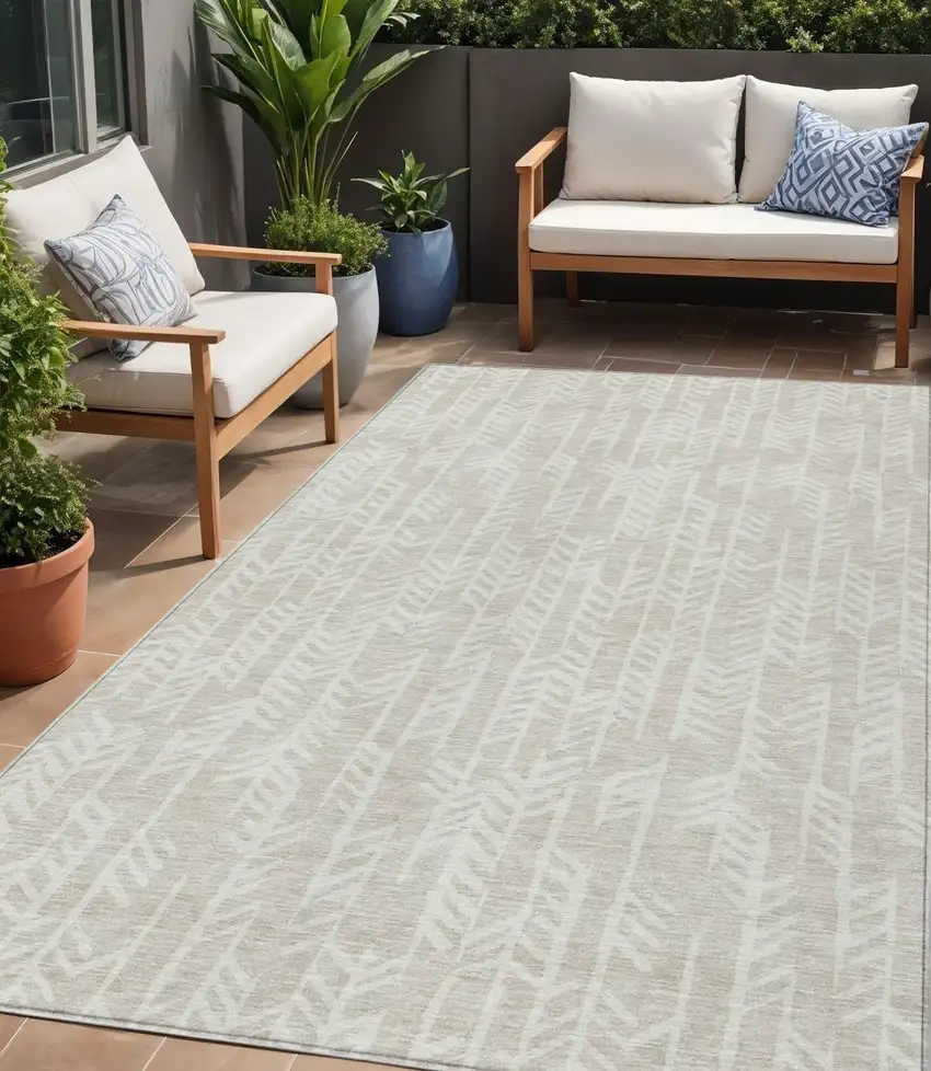 Beige And Ivory Tribal Washable Indoor Outdoor Area Rug Photo 1