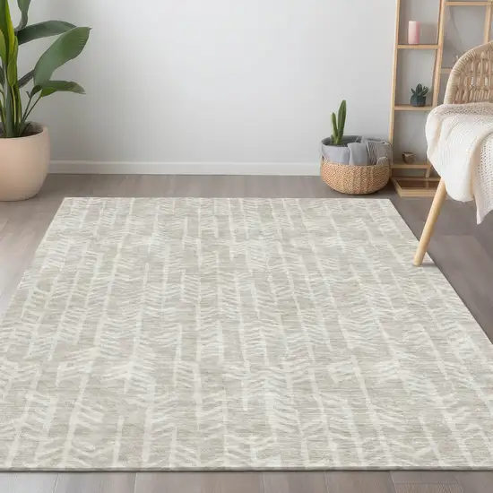 Beige And Ivory Tribal Washable Indoor Outdoor Area Rug Photo 9
