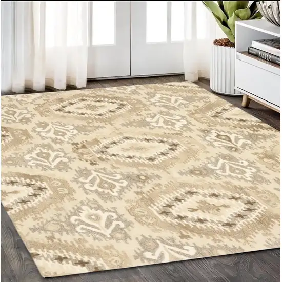 Beige And Ivory Wool Abstract Hand Tufted Area Rug Photo 1