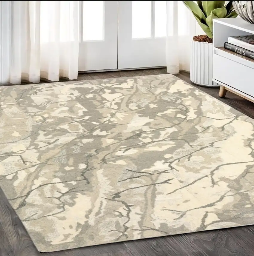 Beige And Ivory Wool Abstract Hand Tufted Area Rug Photo 1