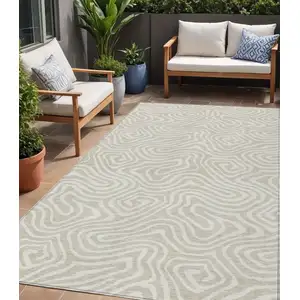 Photo of Beige And Linen Abstract Washable Indoor Outdoor Area Rug