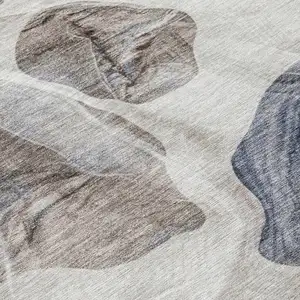 Photo of Beige And Navy Blue Abstract Washable Indoor Outdoor Area Rug