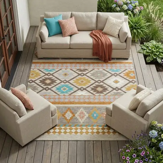 Beige And Orange Southwestern Washable Indoor Outdoor Area Rug Photo 1