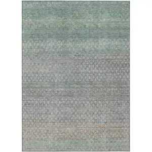Photo of Beige And Pale Aqua Abstract Washable Indoor Outdoor Area Rug