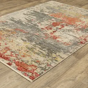 Photo of Beige And Pink Abstract Area Rug With Fringe