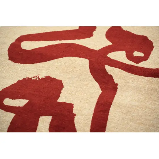 Beige And Red Abstract Washable Area Rug With UV Protection Photo 5