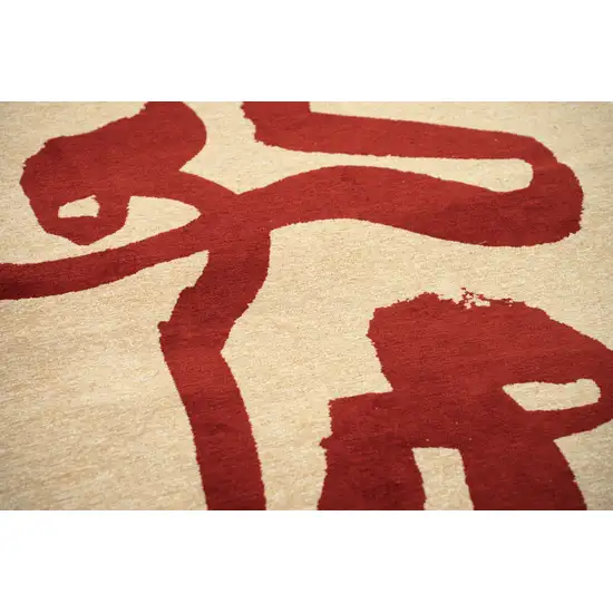 Beige And Red Abstract Washable Area Rug With UV Protection Photo 8
