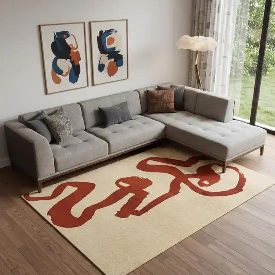 Beige And Red Abstract Washable Area Rug With UV Protection Photo 1