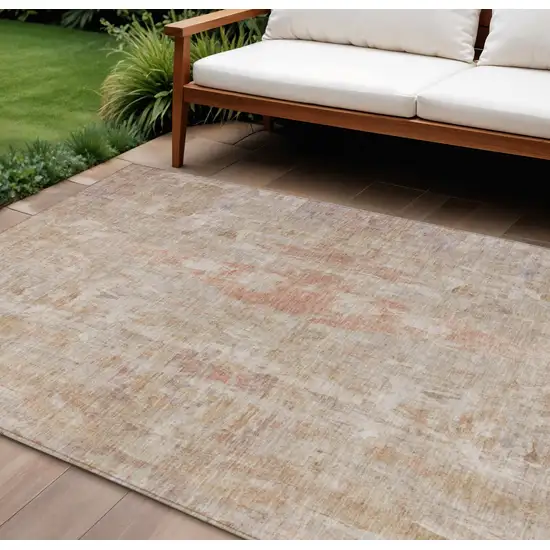 Beige And Salmon Abstract Washable Indoor Outdoor Area Rug Photo 1