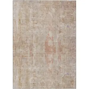 Photo of Beige And Salmon Abstract Washable Indoor Outdoor Area Rug