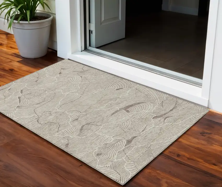 Beige And Tan Abstract Washable Indoor Outdoor Area Rug Photo 1